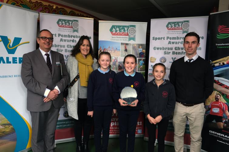 School Award  - Pictured are pupils and teachers from Johnston CP School with Steven Richards-Downes, Director of Education at Pembrokeshire County Council. 